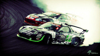 Racing cars smoke track action - a track free wallpaper