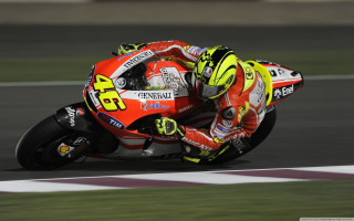 Motorcycle race track leaning person 2 - the background and a person free wallpaper