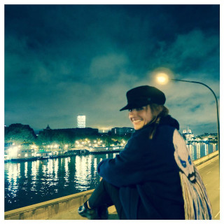 Woman sitting ledge water night - an impressionist painting free wallpaper