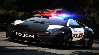 Police car driving street forest - a police car free wallpaper