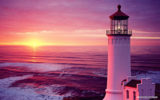 Lighthouse shore sunset pink sky - a lighthouse free wallpaper