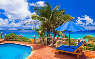 Ocean pool deck chair umbrella 3 - blue sky free wallpaper