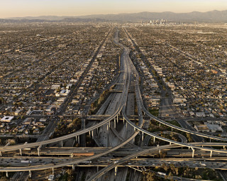 Highway traffic city mountains skyline - a photo free wallpaper