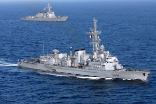 Large gray ship ocean small - a smaller ship in the background free wallpaper
