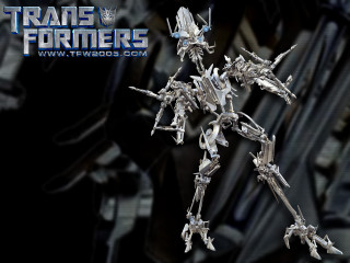 Toy robot gun black background - hand free wallpaper