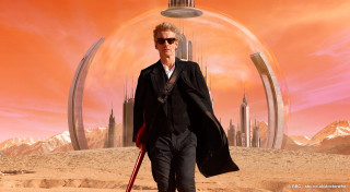 Futuristic city man suit beard - a giant object in the background free wallpaper