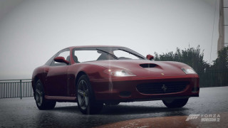 Red sports car wet road 2 - a wet road in the rain free wallpaper