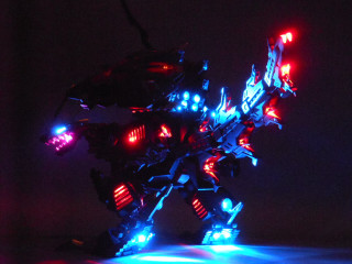 Toy robot lights dark background - cyberpunk art free wallpaper