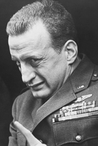 Man uniform pointing hat side - free portrait wallpaper