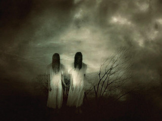Ghostly women field cloudy sky - a field under a cloudy sky free wallpaper