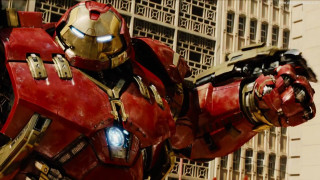 Giant iron man building gun - his hand and a helmet free wallpaper