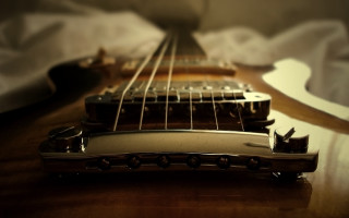 Guitar neck strings bed sheet - a close up of a guitar neck free wallpaper