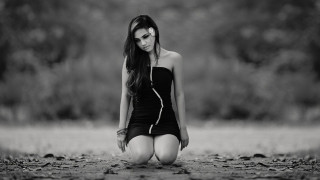 Woman black dress sitting blurry - her pocket free wallpaper