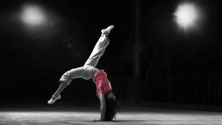 Handstand brick floor dark room - a handstand free wallpaper