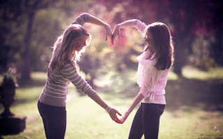 Two girls holding hands park - anna and elena balbusso free wallpaper