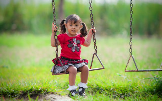Little girl swing park grass - a little girl free wallpaper