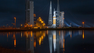 Large building lights water night 2 - free new year wallpaper