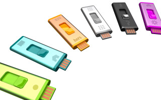 Colored usb devices white surface - product photo free wallpaper