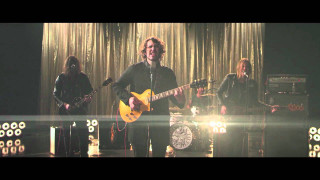 Man playing guitar on stage 4 - stage free wallpaper