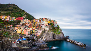 Small village cliff ocean boats - a small village free wallpaper