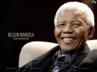 Man smiling chair black background - visionary free wallpaper