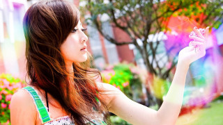 Woman holding pink flower rainbow - photographic free wallpaper