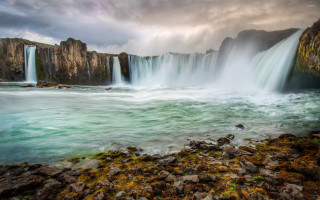 Waterfall water rocky shore sides - a large amount of water free wallpaper