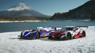 Race cars snowy lake mountain - an gyeon free wallpaper for desktop