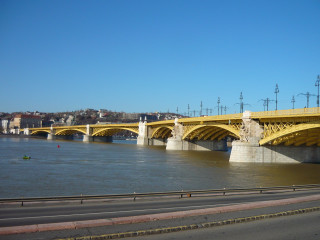 Bridge river yellow building clock - aladár körösfőikriesch free wallpaper