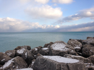 Rocky shore snowy rocks water - the rock and water free wallpaper