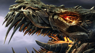 Dinosaur closeup spikes cloudy sky - dragon art free wallpaper