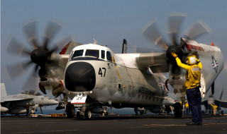 Man propeller plane runway background - a propeller plane free wallpaper