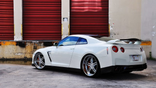 White sports car red garage - plasticien free wallpaper