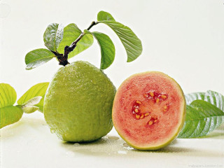 Green fruit half cut leaves - food photography free wallpaper