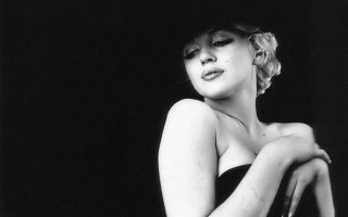 Woman black dress hat sitting 2 - a black dress and hat free wallpaper