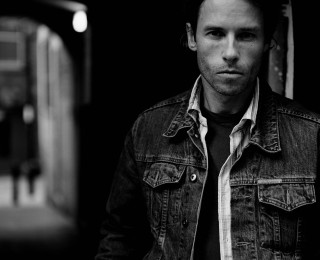 Man denim jacket tie doorway - private free wallpaper