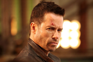 Man leather jacket red eye - a serious look free wallpaper