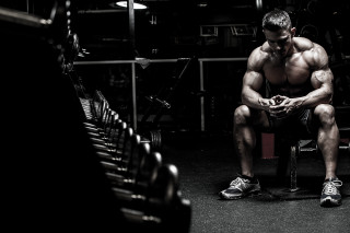 Man sitting bench gym hands - his leg free wallpaper