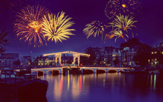 Bridge lit arch fireworks river - a bridge free wallpaper