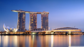Large building lights water nighttime - night time free wallpaper for desktop