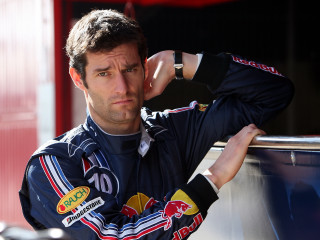 Man racing suit leaning wall - racing free wallpaper