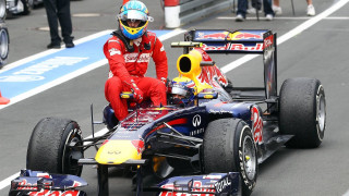 Man red suit sitting race - a race car free wallpaper