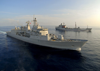 Large ship small ship ocean 2 - a smaller ship in the background free wallpaper