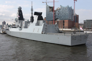 Battleship water city skyline tall - a large battleship free wallpaper