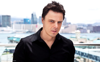Man black shirt cityscape looking - something free wallpaper