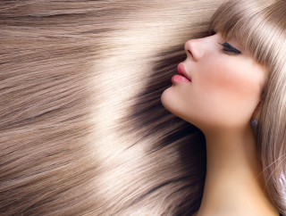 Woman blonde hair laying eyes - flowing hair free wallpaper