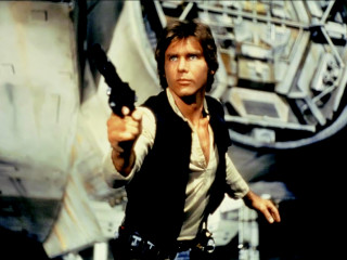 Man gun pointing camera left - hand free wallpaper