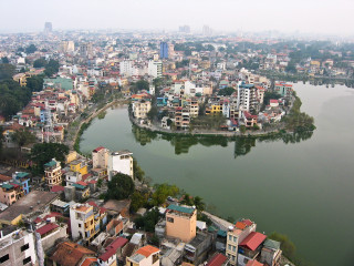 City river buildings bridge crossing - aerial free wallpaper