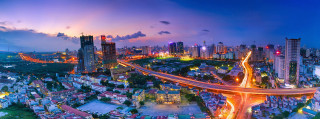 City bridge highway night skyline - a city skyline in the background free wallpaper
