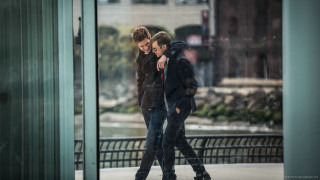 Two people walking rain building - david boyd free wallpaper